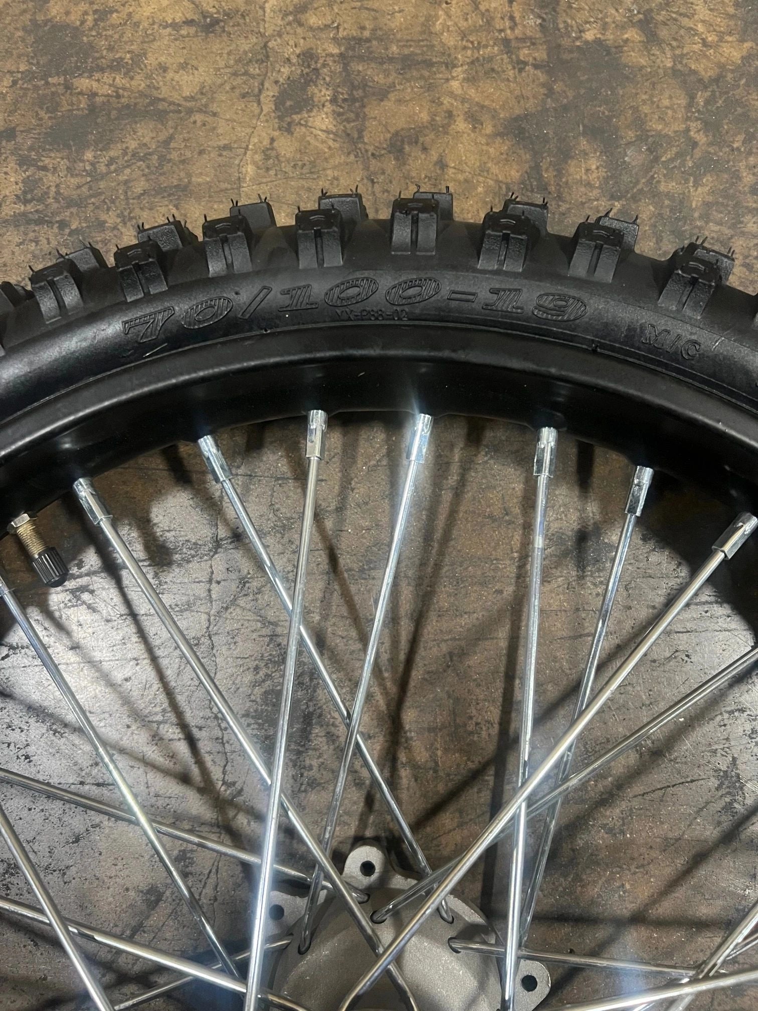front-wheel-assy-black-rim-tire-70x100-19-with-tube-and-tire-without-brake-disc