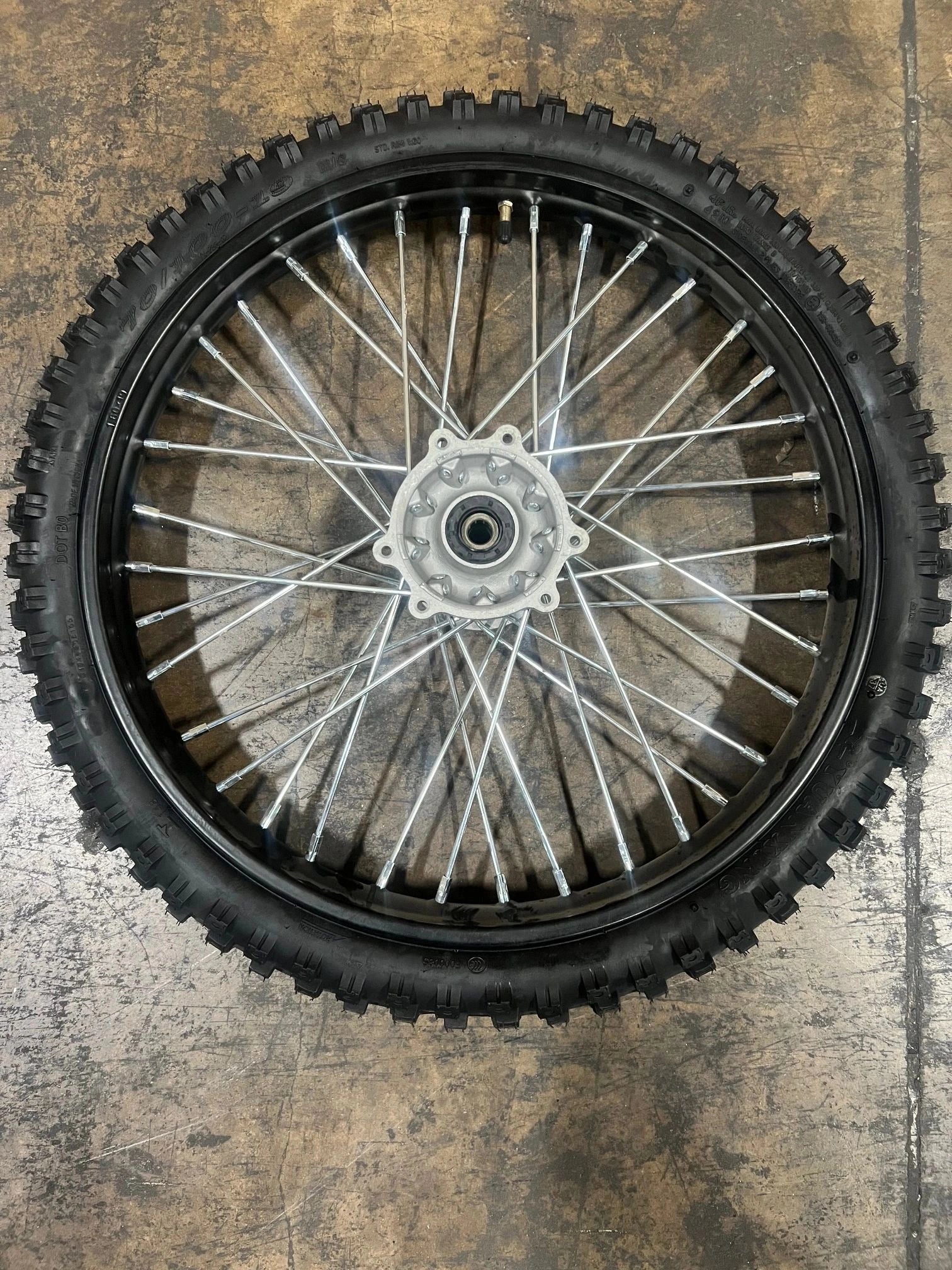 Front Wheel Assy. Black rim. Tire, 70/100-19. With tube and tire. Without brake disc.